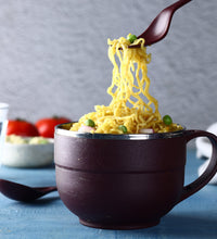 Stainless steel bowl with lid and spoon for versatile kitchen use