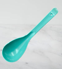 Set of plastic serving spoons.