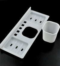 Detailed view of 4 in 1 plastic soap dish showing its compartments.