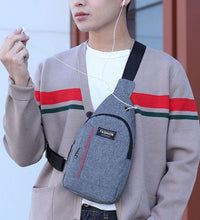 Grey crossbody fanny pack with earphone hook