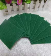 Set of 10 aqua green cleaning pads for scrubbing tasks.