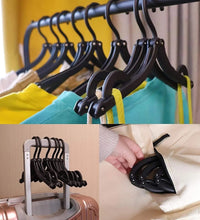 Travel-friendly foldable hangers for efficient clothes drying and storage.