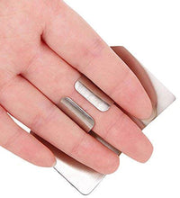 Kitchen finger guard made of stainless steel for safe chopping.