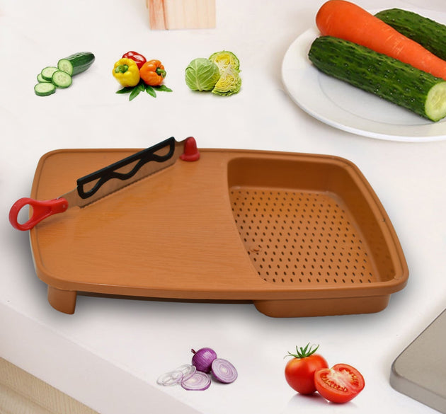 Thick plastic kitchen chopping board with holder.