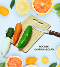 Wooden board with knife