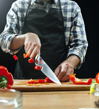 Wooden chopping board on counter