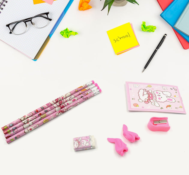 Kids' stationery kit with wooden pencils and sharpener.