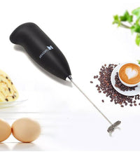 Handheld blender for blending and mixing food ingredients.