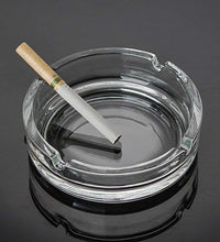 Durable crystal ashtray with a sleek design.