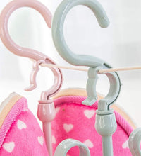 Adjustable and rotatable shoe hanger for effective drying in closet or balcony.