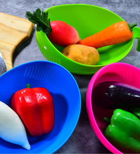 Set of plastic strainers and bowls with handles for food