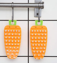 Carrot-shaped fruit brush for scrubbing vegetables