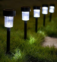 Sleek solar LED garden light with spike installation for easy placement.