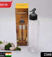 Clear plastic oil bottle, 1 liter, for easy dispensing.