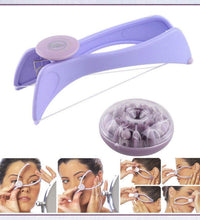 Slique hair removal device with manual threading feature.