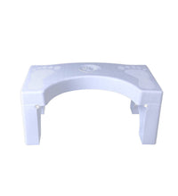 Folding squat stool for toilets, white with a non-slip surface.