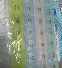 Transparent 7-day pill storage box with 4 rows for easy medication management.