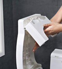 Non-slip, foldable white squat stool for improved toilet comfort.