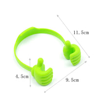 Unique hand-shaped mobile phone holder, perfect for office and home use.