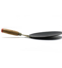 Heavy-duty wooden handle roti tawa, perfect for making rotis and parathas.