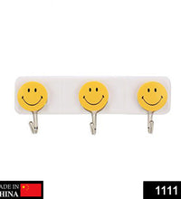 Cute smiley wall hooks with adhesive backing.