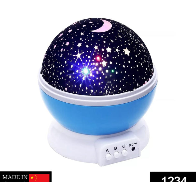 Rotating projection night lamp with star patterns