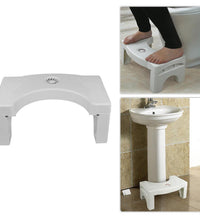 White plastic folding toilet squat stool with non-slip design.