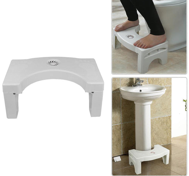 White plastic folding toilet squat stool with non-slip design.