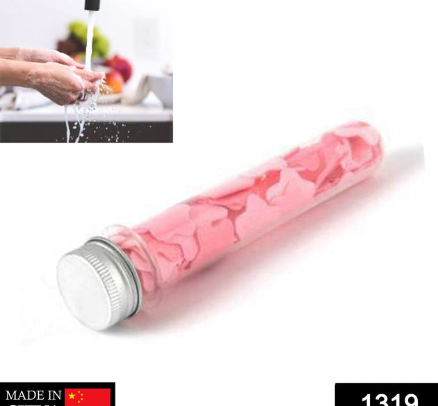 Flower-shaped paper soap strips in a test tube bottle.