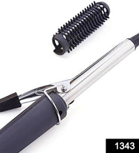 Professional hair curling rod with ergonomic handle.