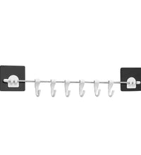 Multipurpose self-adhesive hanger hooks, plastic, for various uses.