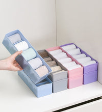 Plastic organizer with dividers, perfect for sorting beads and other small items.