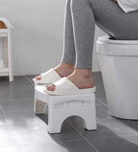 Compact white toilet squat stool with foldable and non-slip features.