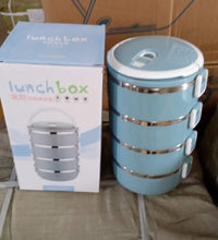 Stainless steel lunch box with four layers for hot food.