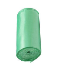 Green biodegradable garbage bags for eco-friendly waste disposal.