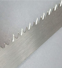 Pruning saw with handle close-up.