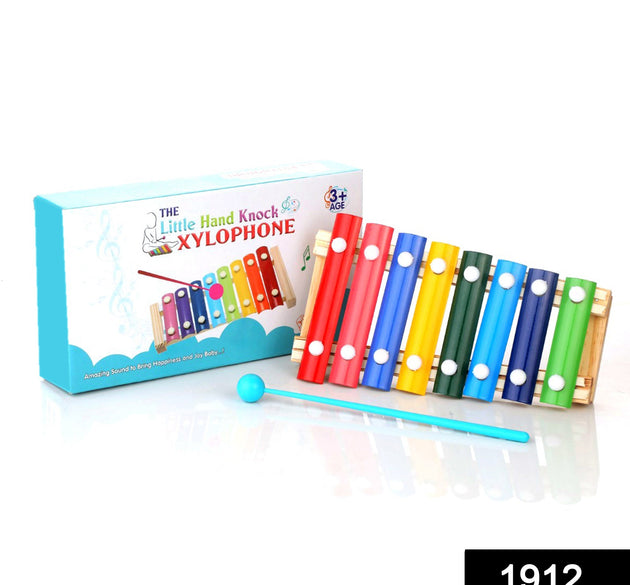 Colorful wooden xylophone with multicolored bars and mallet