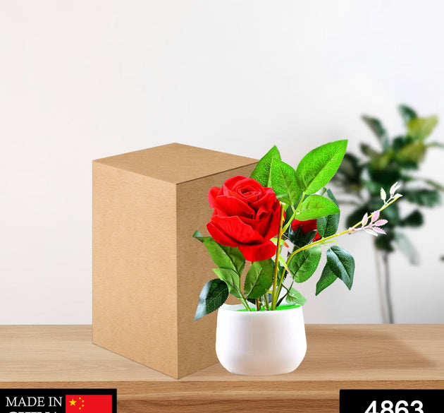 Artificial rose plant in a decorative pot