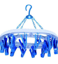 Round plastic cloth drying stand with 18 clips in multicolour.