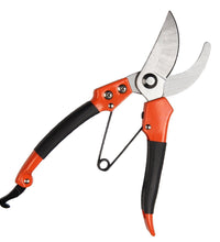 Sharp garden shears for pruning and trimming plants.