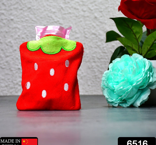 Mini hot water bag with strawberry design for neck and shoulder pain.