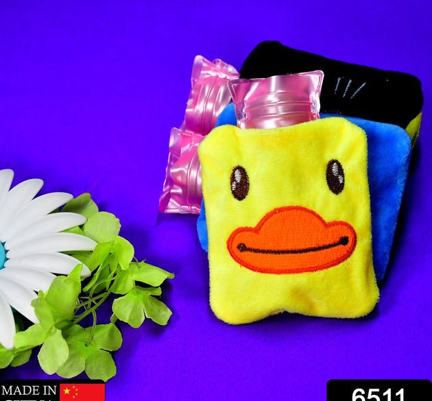 Yellow duck hot water bag with cover for pain relief and warming