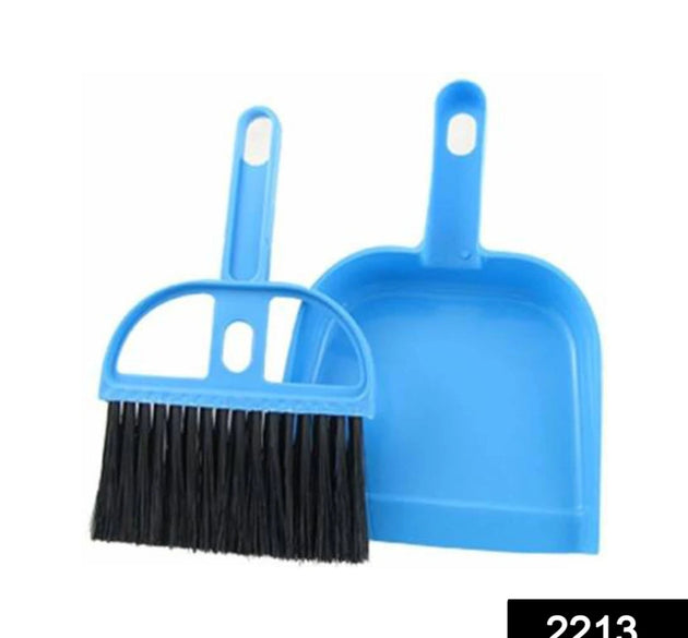 Small dustpan and broom set for multipurpose cleaning.