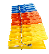 Durable plastic clips for cloth drying in assorted colors (12 pcs).