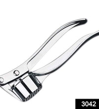 Multi-function garlic press and squeezer