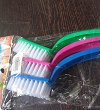 Set of cleaning brushes for multi-purpose use in the kitchen.