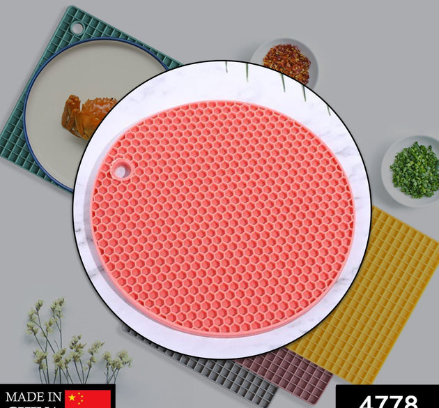 Silicone hot mat designed to protect surfaces from hot cookware with a flexible material.