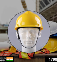 Bright yellow construction helmet, made of sturdy plastic for safety.