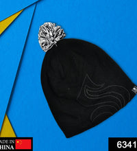 Black inside fur beanie cap with a skull design.