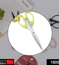 the stainless steel scissors, highlighting the plastic handle grip and sharp blades